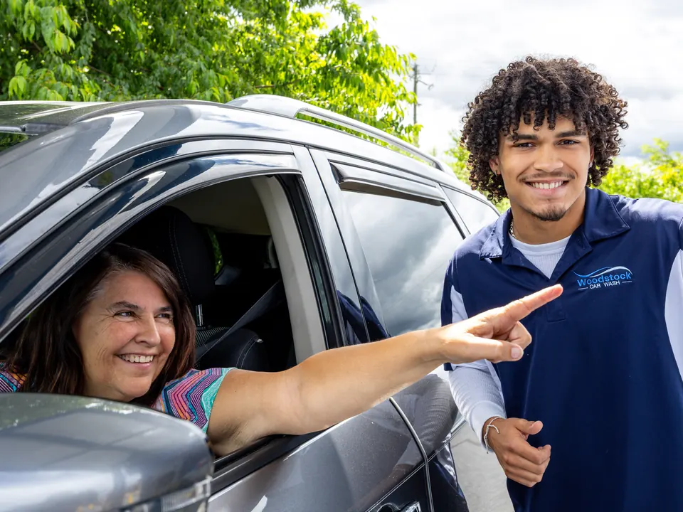 Woodstock Car Wash employee helping a customer in Woodstock, Virginia